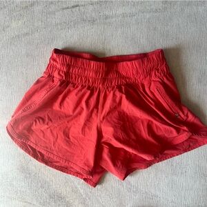 Lululemon Tracker Short V *4" in Pink Punch color